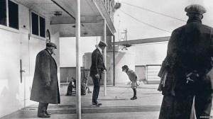This father and son shown on the deck of the Titanic were preserved in this photo by Father Francis Browne who disembarked from the ship in Ireland, thus saving the only photos from the ship while it was at sea.